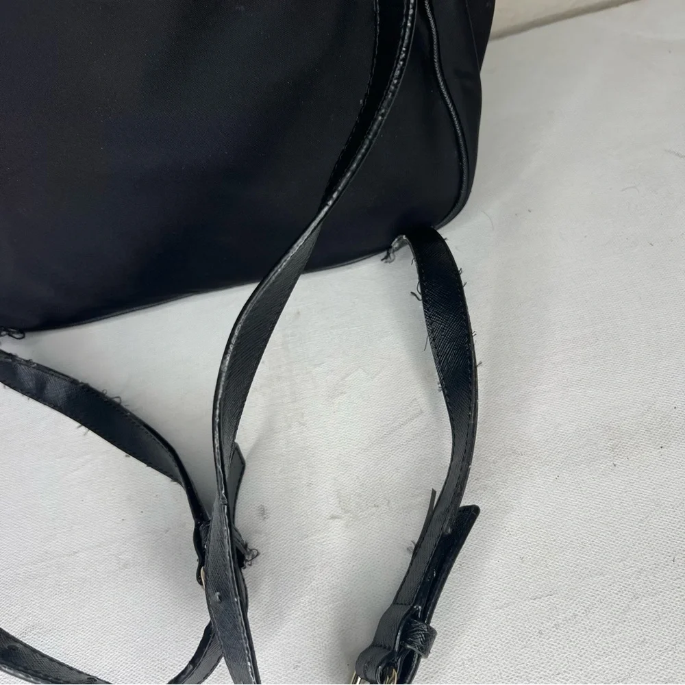 Kate Spade black gold zippers back pack
